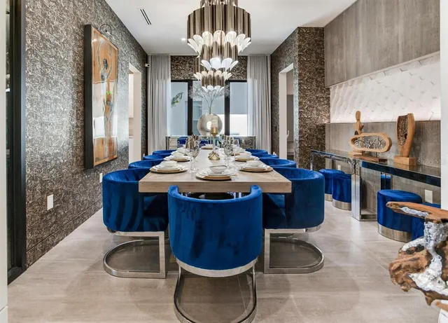 a kitchen with stainless steel appliances a stove and cabinets