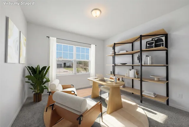 a living room with furniture and a piano