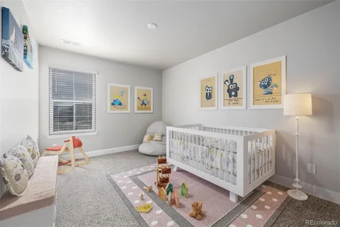 a living room with furniture and window