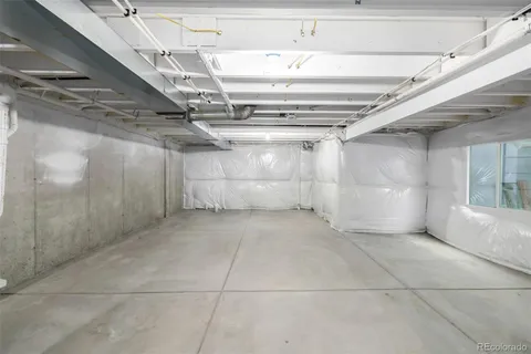 a view of two chairs in the patio