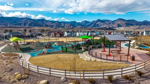 a view of a chairs and table in the patio