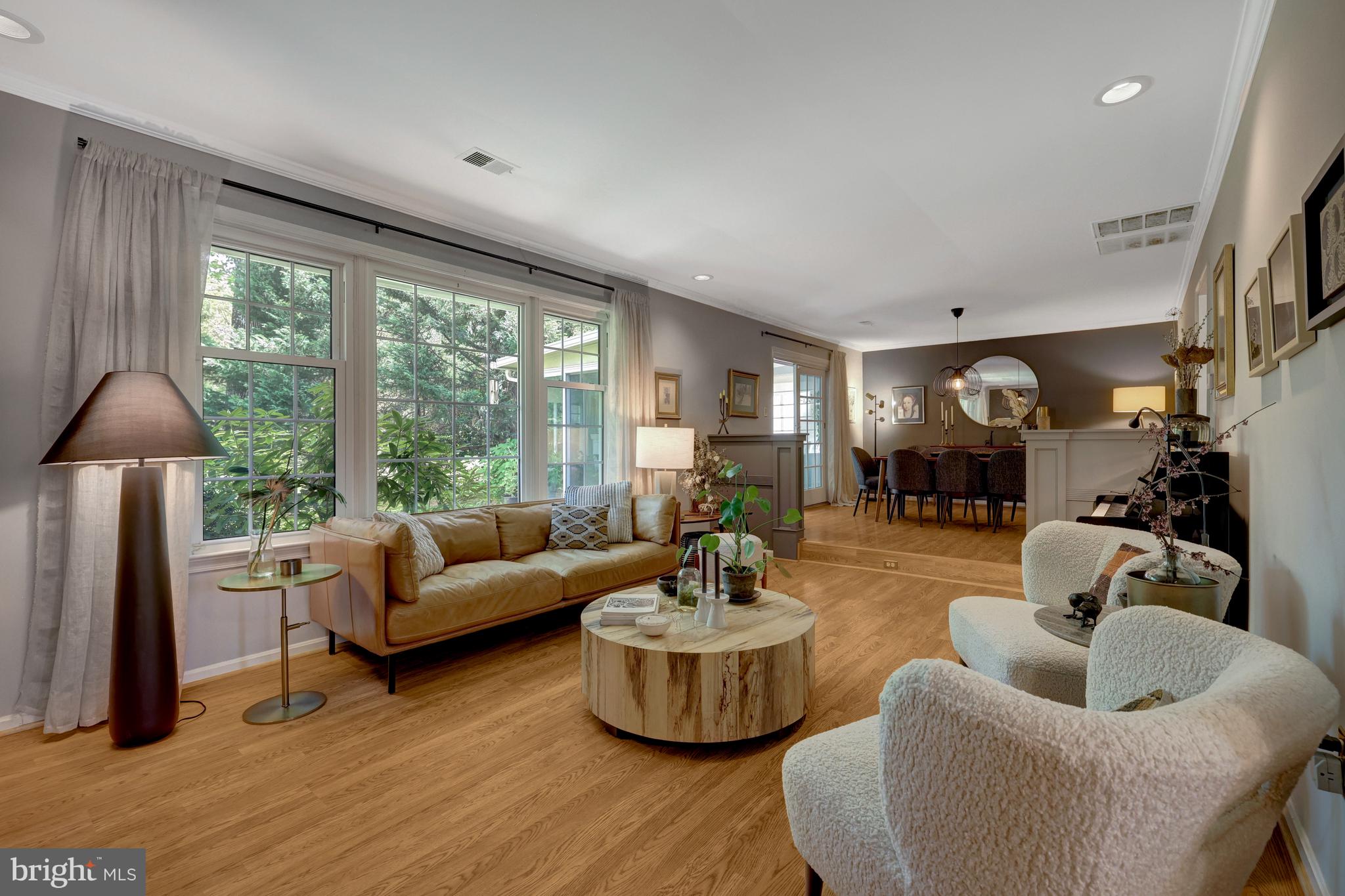 9001 Streamview Lane Vienna, VA 22182 - Photo 14 of 64 a living room with furniture and a large window