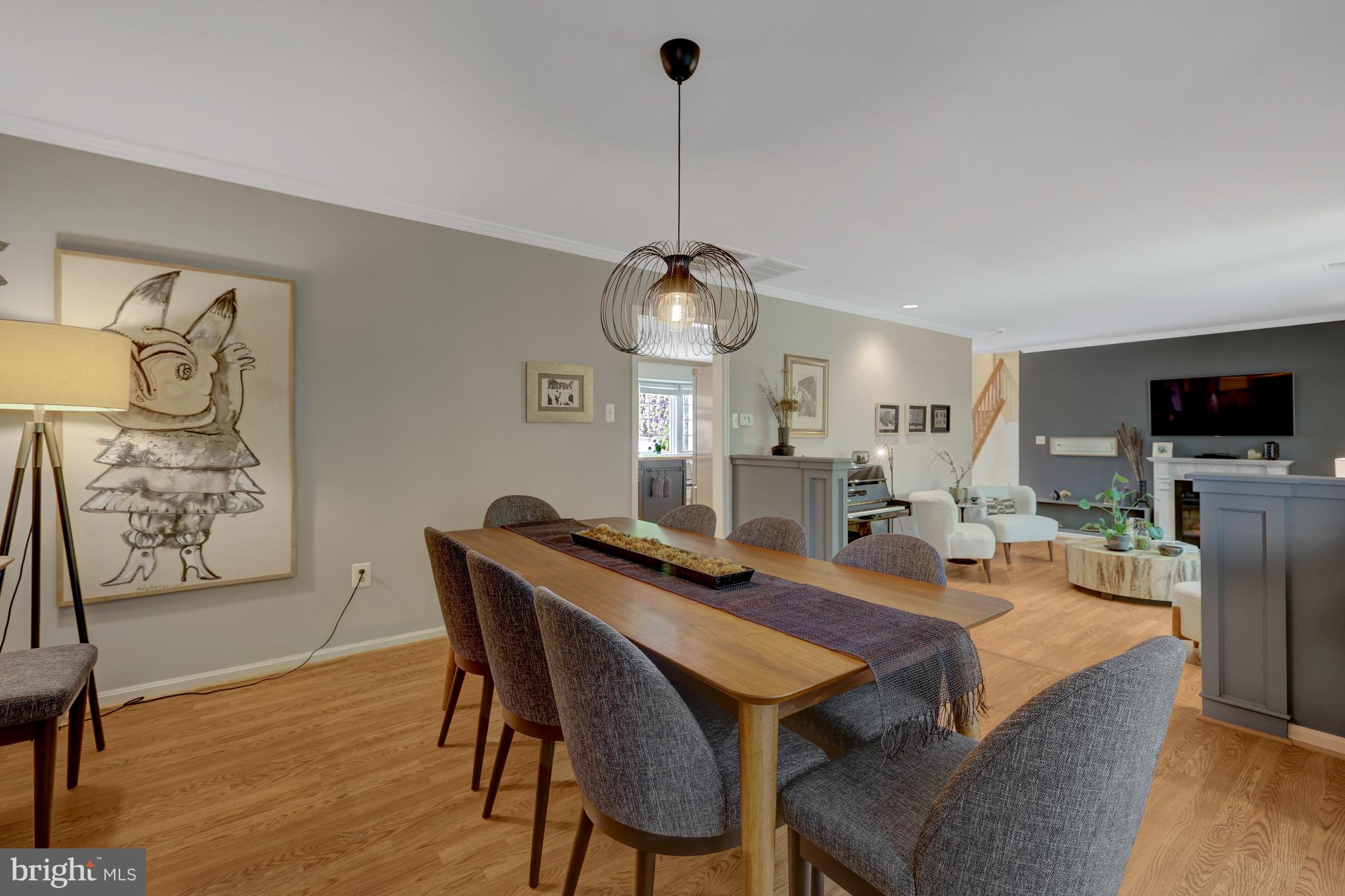 9001 Streamview Lane Vienna, VA 22182 - Photo 17 of 64 a view of a dining room with furniture window and wooden floor
