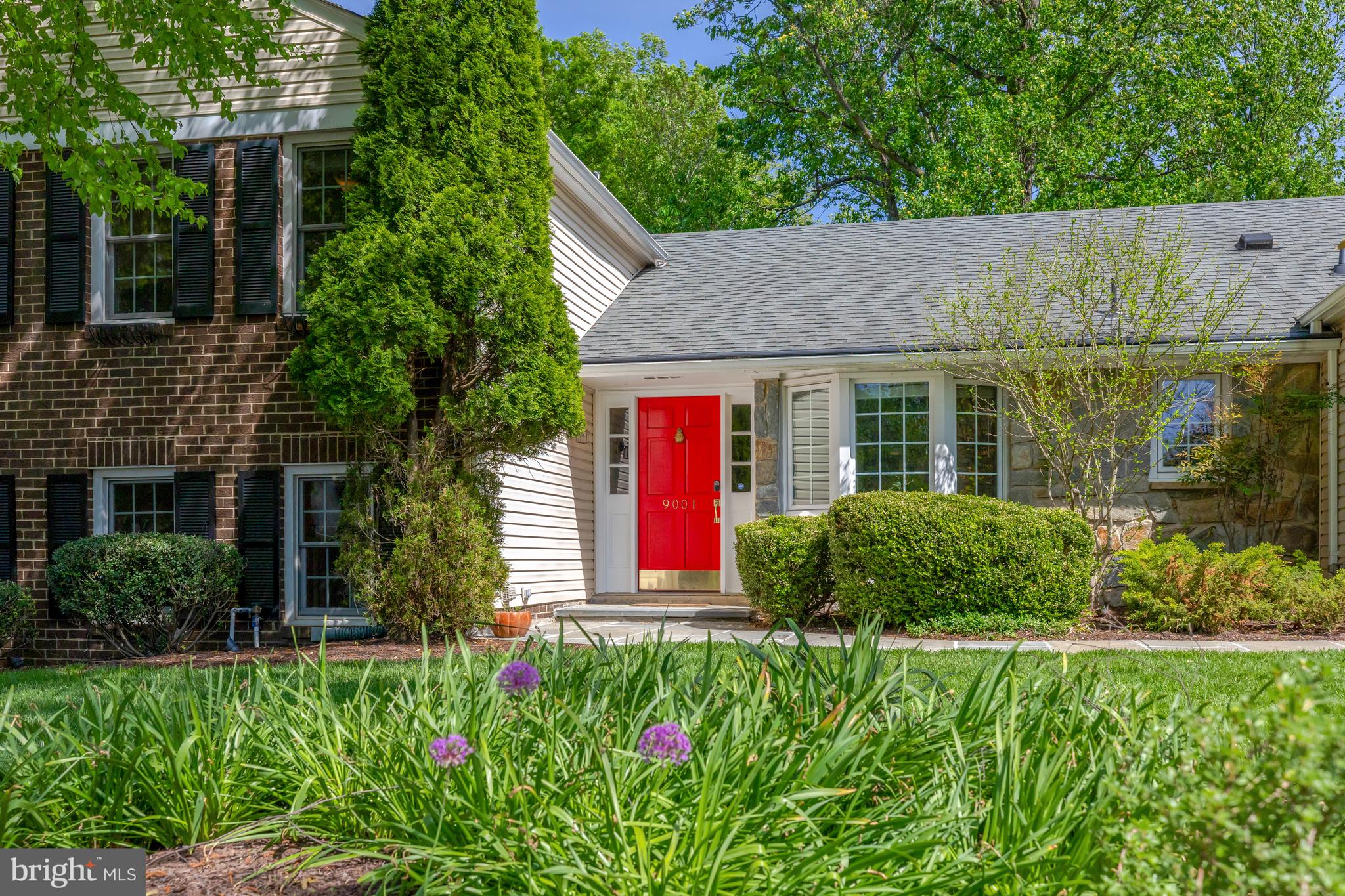 9001 Streamview Lane Vienna, VA 22182 - Photo 2 of 64 a house view with a garden space