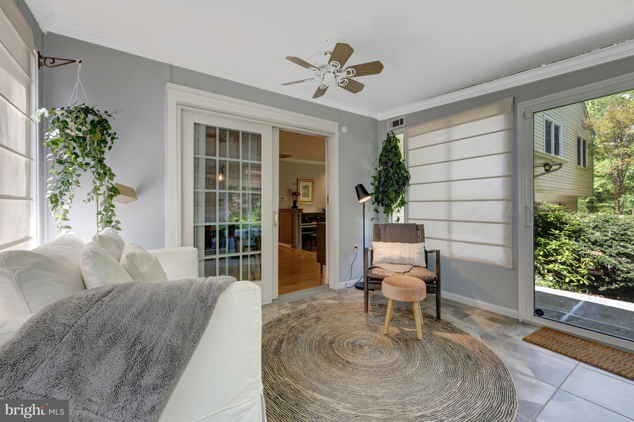 9001 Streamview Lane Vienna, VA 22182 - Photo 26 of 64 a living room with furniture and a potted plant