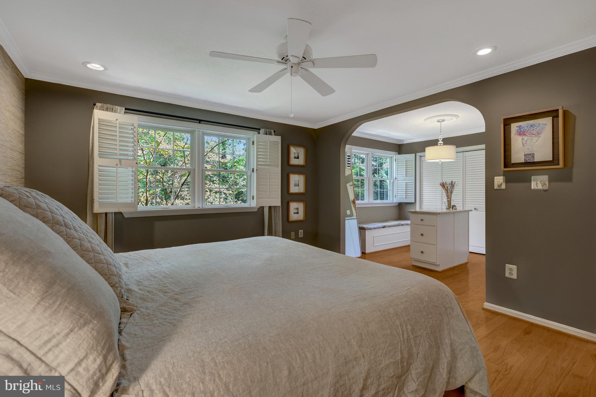 9001 Streamview Lane Vienna, VA 22182 - Photo 30 of 64 a large bedroom with a large bed and a large window