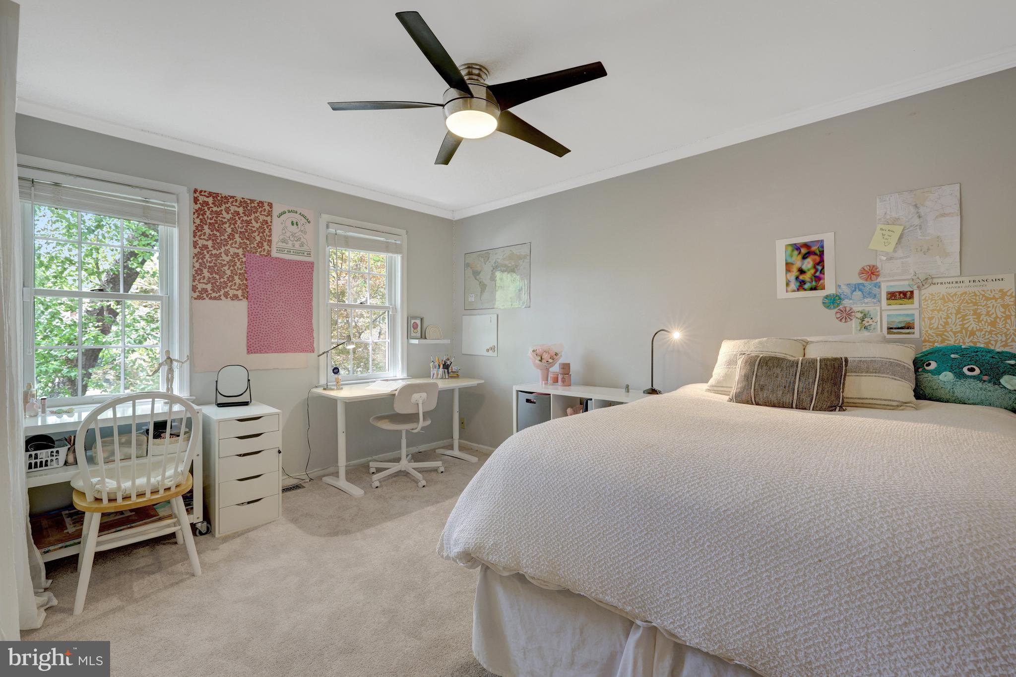 9001 Streamview Lane Vienna, VA 22182 - Photo 37 of 64 a bedroom with a bed and a large window