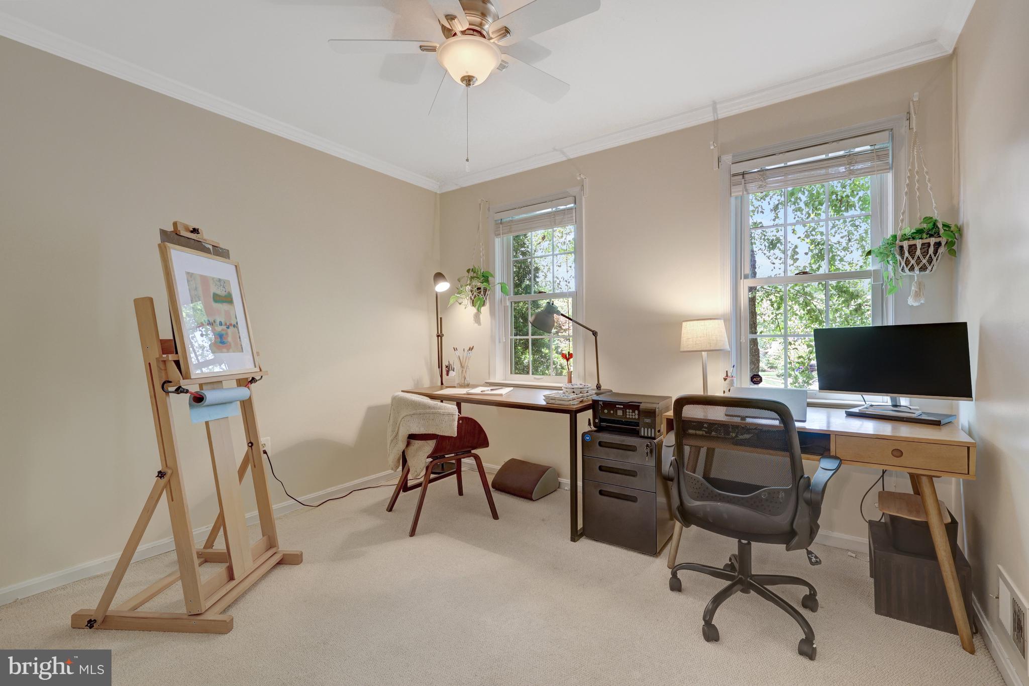 9001 Streamview Lane Vienna, VA 22182 - Photo 39 of 64 a view of a workspace with furniture and a window