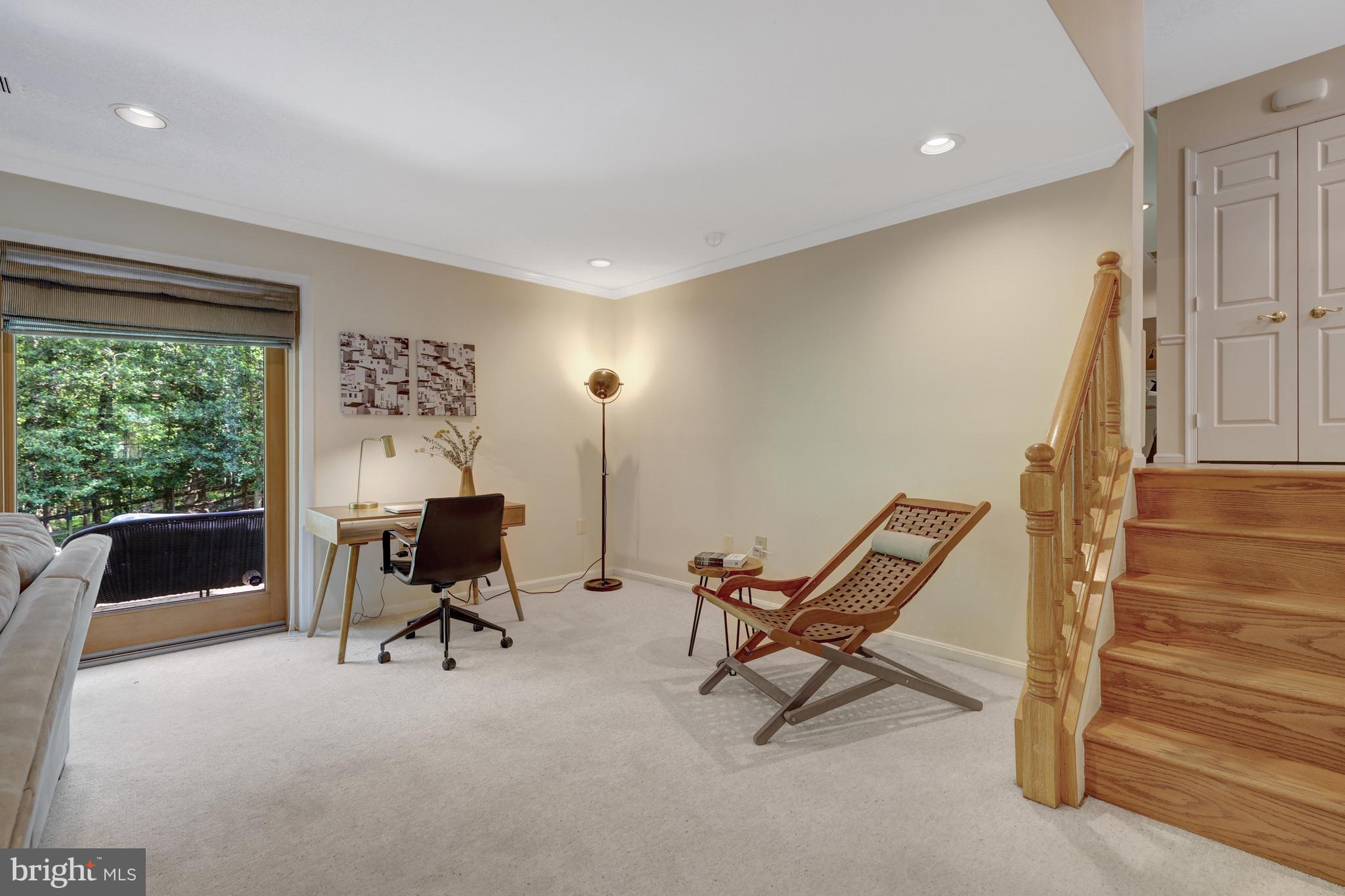 9001 Streamview Lane Vienna, VA 22182 - Photo 46 of 64 a view of a workspace with furniture and a window