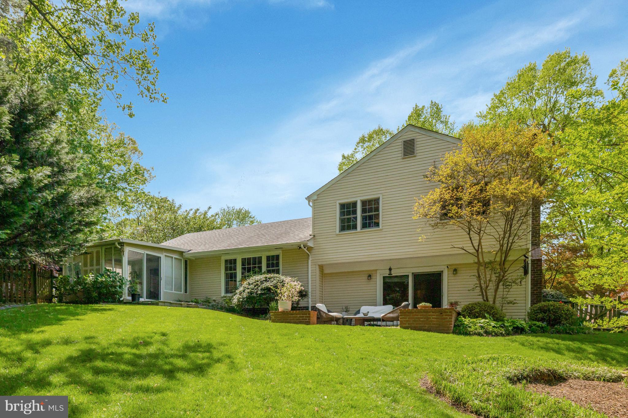 9001 Streamview Lane Vienna, VA 22182 - Photo 55 of 64 a front view of house with yard and green space