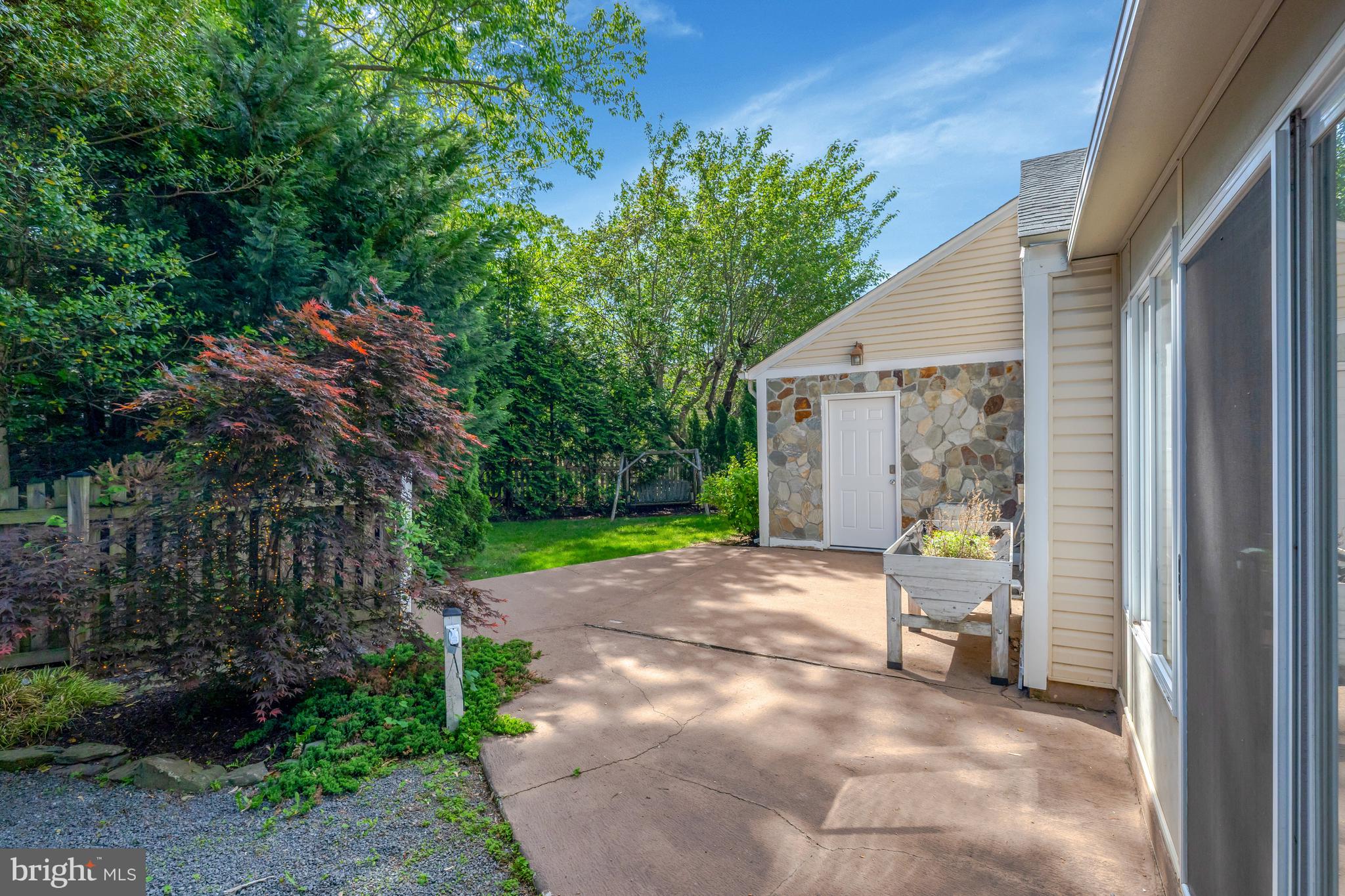 9001 Streamview Lane Vienna, VA 22182 - Photo 56 of 64 a view of backyard with outdoor seating and green space