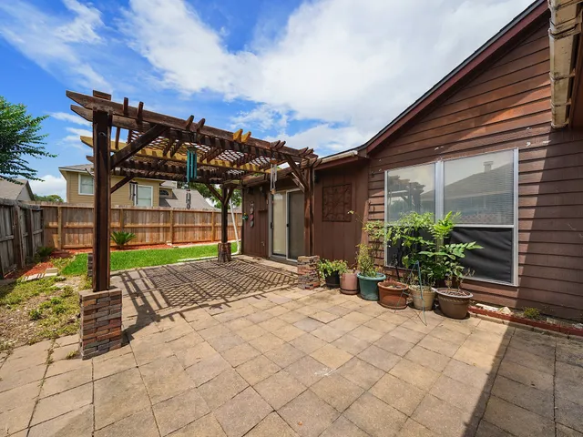 a view of a house with a patio