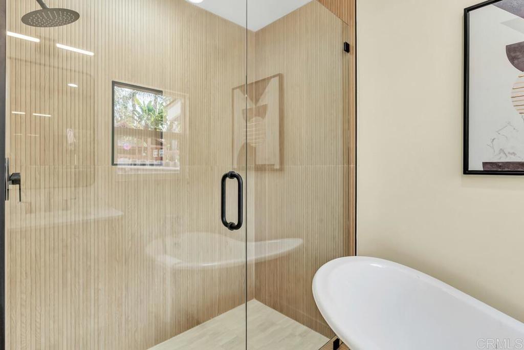 1165 Oak Drive Vista, CA 92084 - Photo 31 of 33 a bathroom with a shower