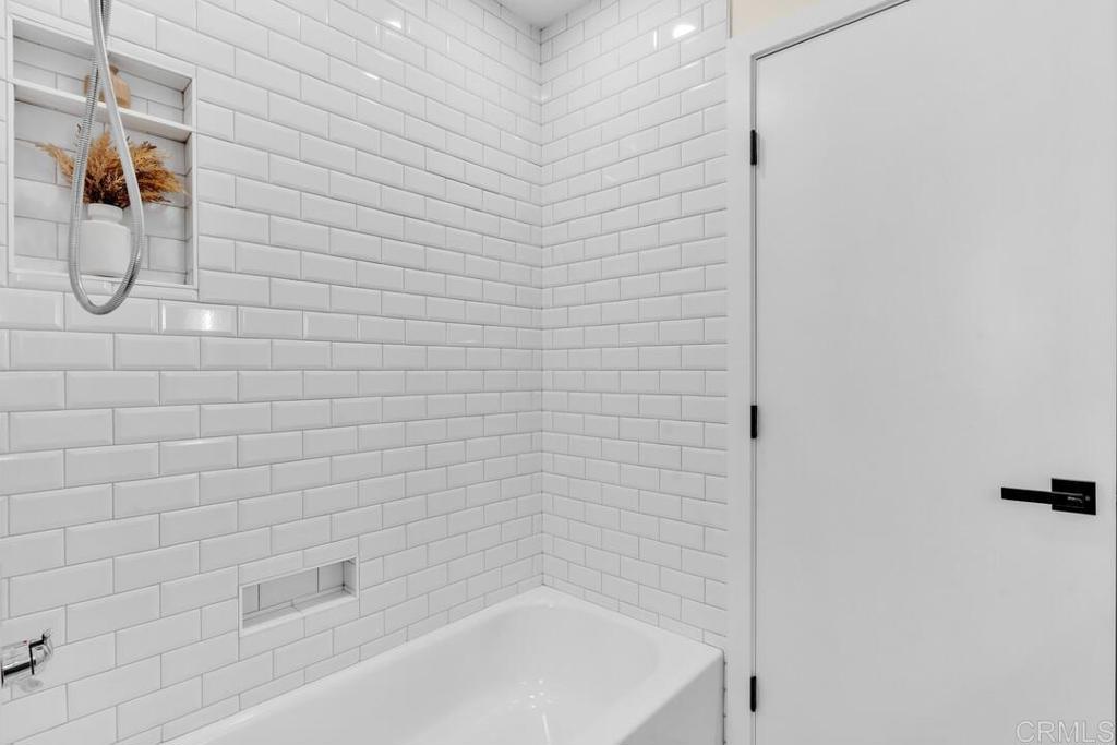 1165 Oak Drive Vista, CA 92084 - Photo 6 of 33 a bathroom with a shower