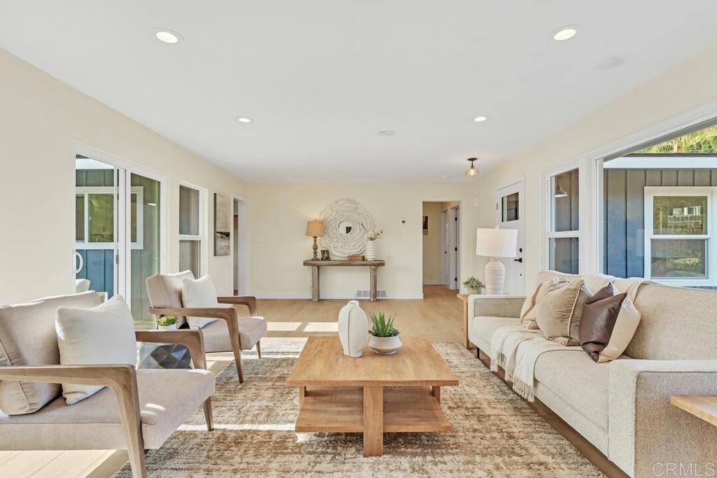 1165 Oak Drive Vista, CA 92084 - Photo 10 of 33 a living room with furniture and a large window