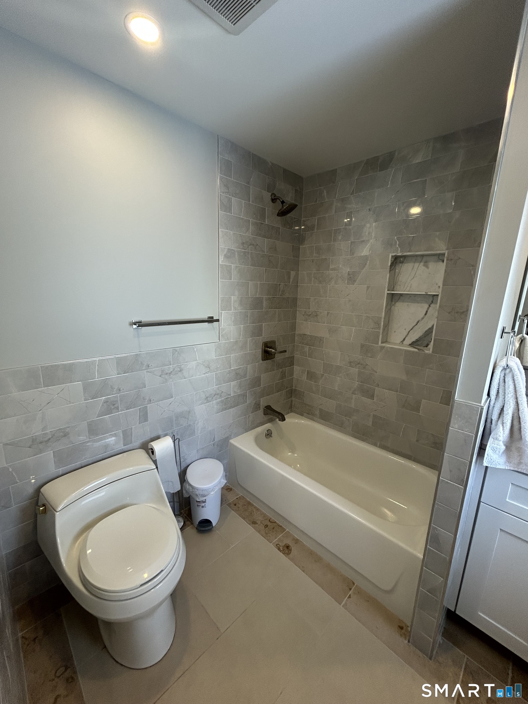 54 Forest Street, Unit 2 Torrington, CT 06790 - Photo 19 of 36 a bathroom with a toilet a sink and bathtub