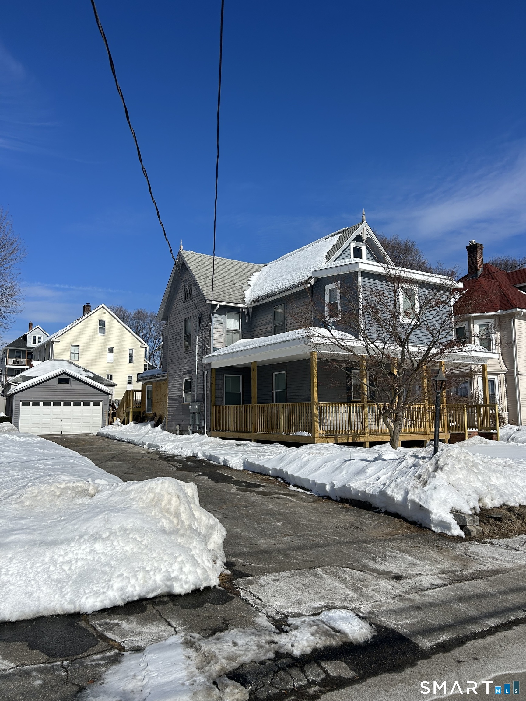 54 Forest Street, Unit 2 Torrington, CT 06790 - Photo 2 of 36 a front view of a house with a ocean view