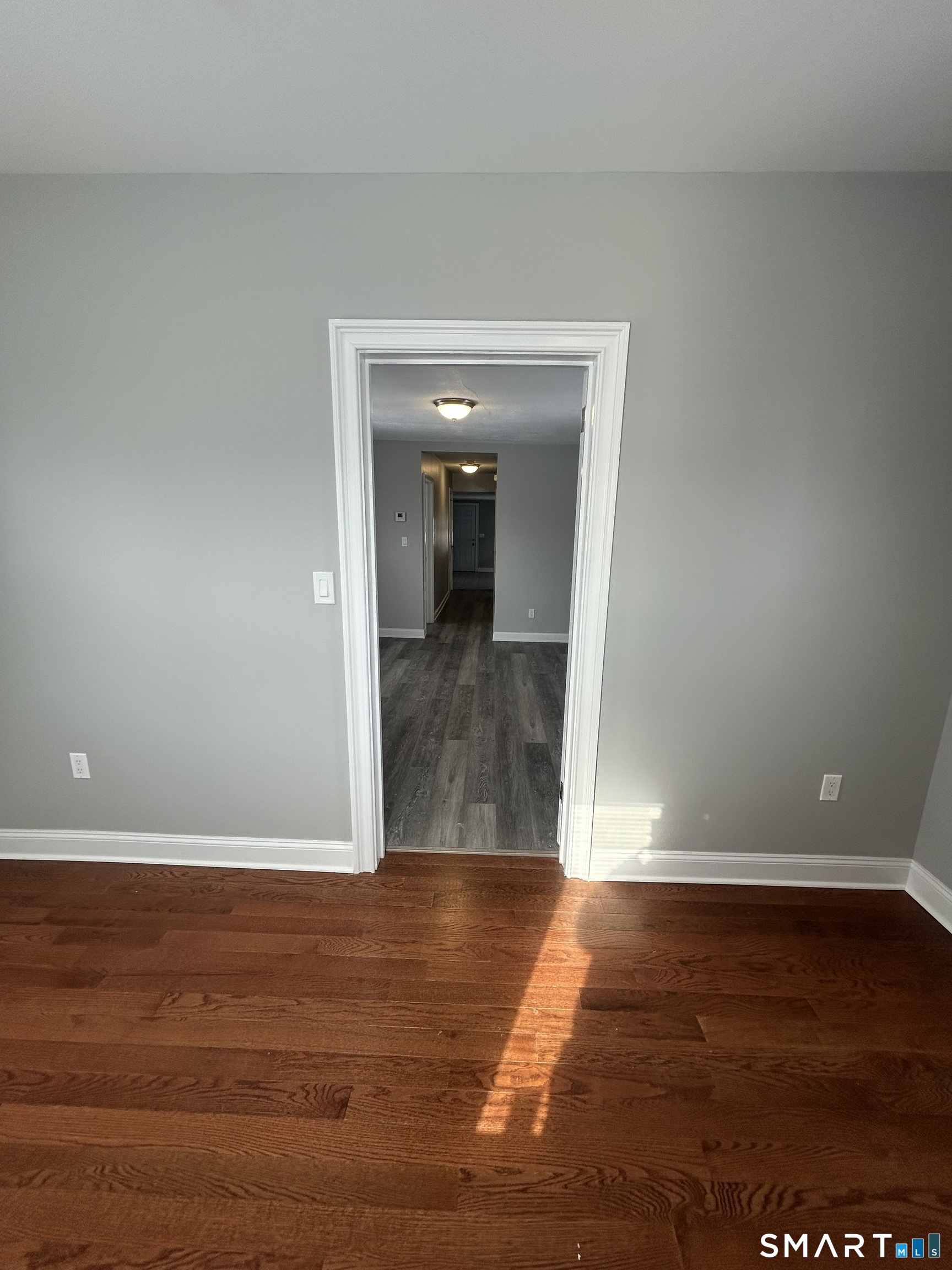 54 Forest Street, Unit 2 Torrington, CT 06790 - Photo 36 of 36 a view of a room with wooden floor