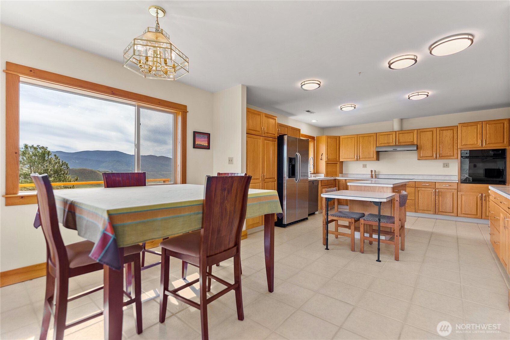 427 Rendezvous Road Winthrop, WA 98862 - Photo 19 of 40 a view of a dining room with furniture window and outside view