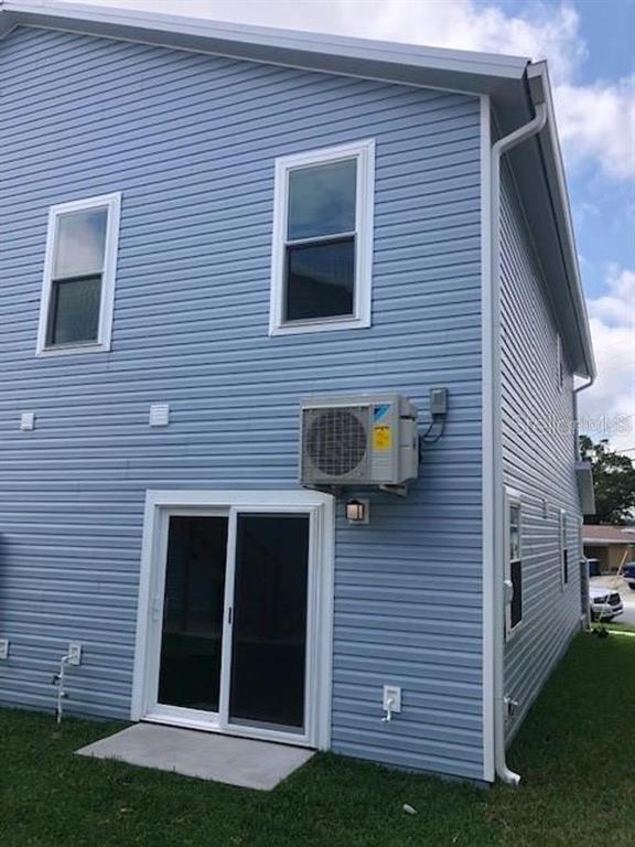 1272 Pierce Street Clearwater, FL 33756 - Photo 12 of 14 a front view of a house with garage