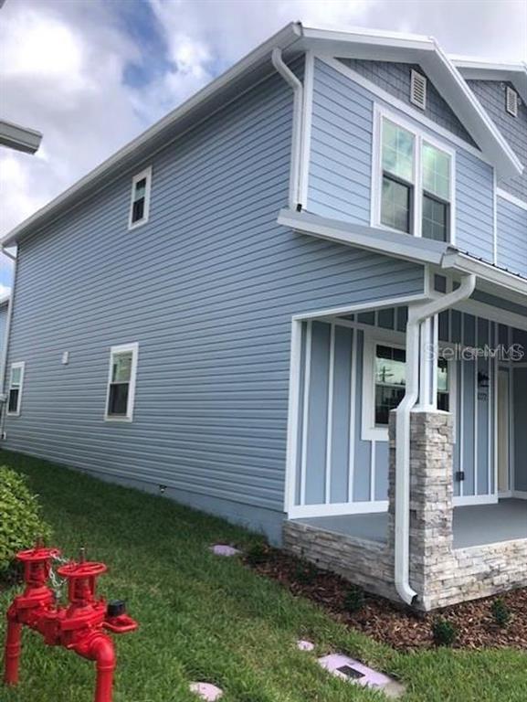 1272 Pierce Street Clearwater, FL 33756 - Photo 13 of 14 a front view of a house with a yard