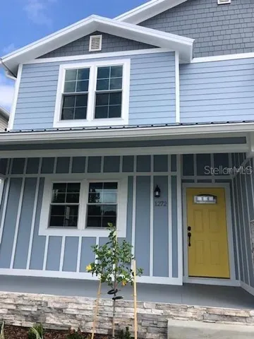 a front view of a house having yard