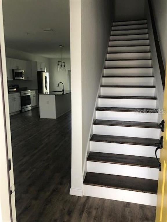 1272 Pierce Street Clearwater, FL 33756 - Photo 8 of 14 a view of entryway and hall with wooden floor