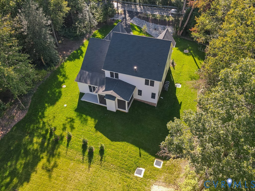 1509 Buford Road North Chesterfield, VA 23235 - Photo 5 of 50 an aerial view of a house with swimming pool a yard and trees