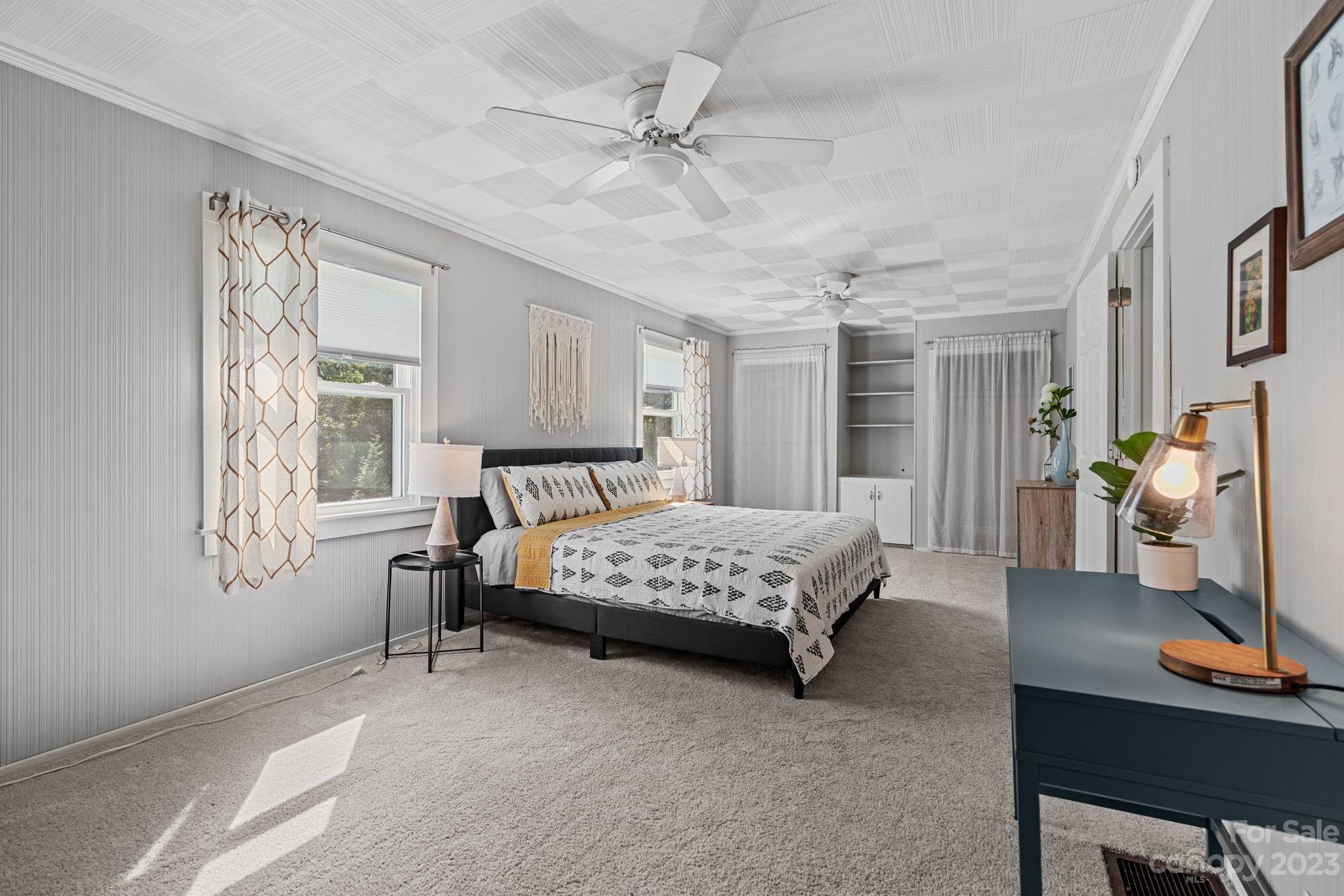 35 Old Fort Road Fairview, NC 28730 - Photo 16 of 30 a bedroom with a bed and a desk