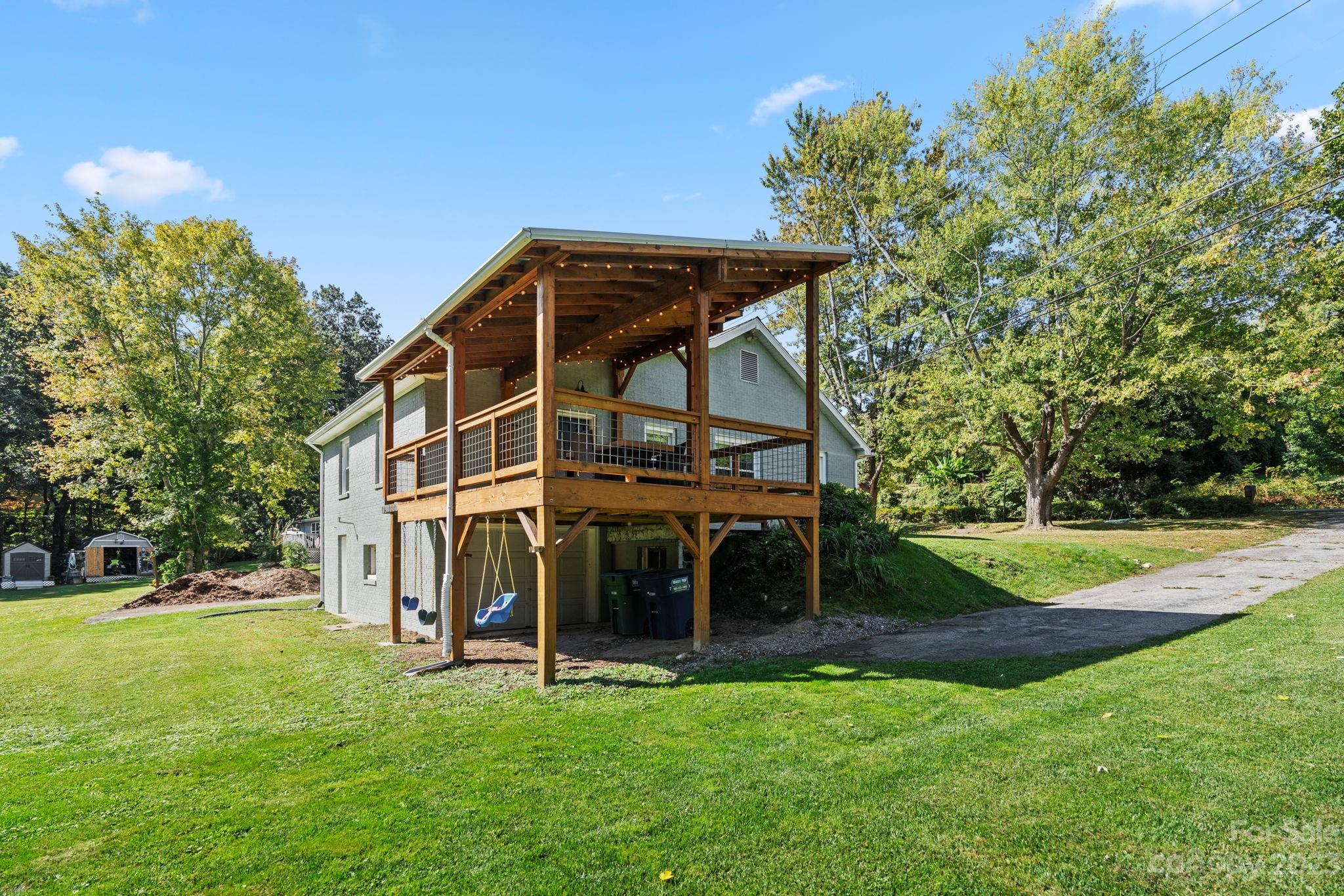 35 Old Fort Road Fairview, NC 28730 - Photo 25 of 30 a view of a house with a yard