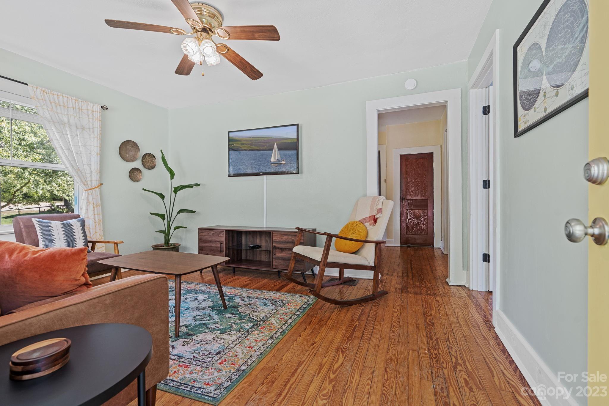 35 Old Fort Road Fairview, NC 28730 - Photo 5 of 30 a living room with furniture and wooden floor