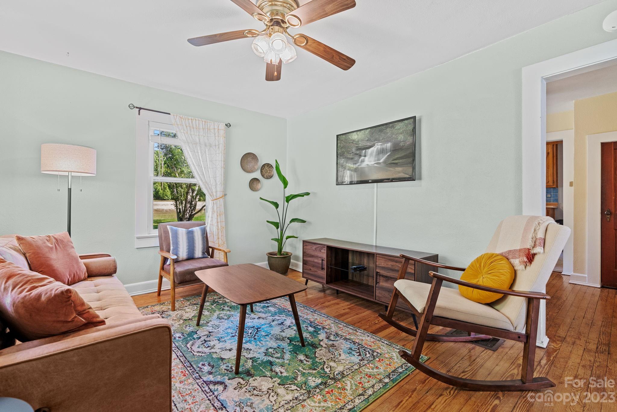 35 Old Fort Road Fairview, NC 28730 - Photo 6 of 30 a living room with furniture and a wooden floor