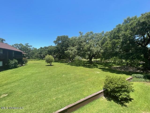 209 Molokai, Unit C Diamondhead, MS 39525 - Photo 9 of 18 BACK LANAI VIEW