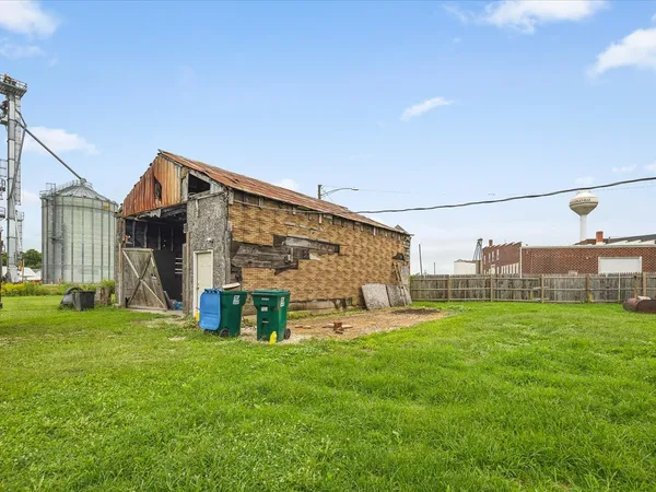 a backyard of a house with lots of green space