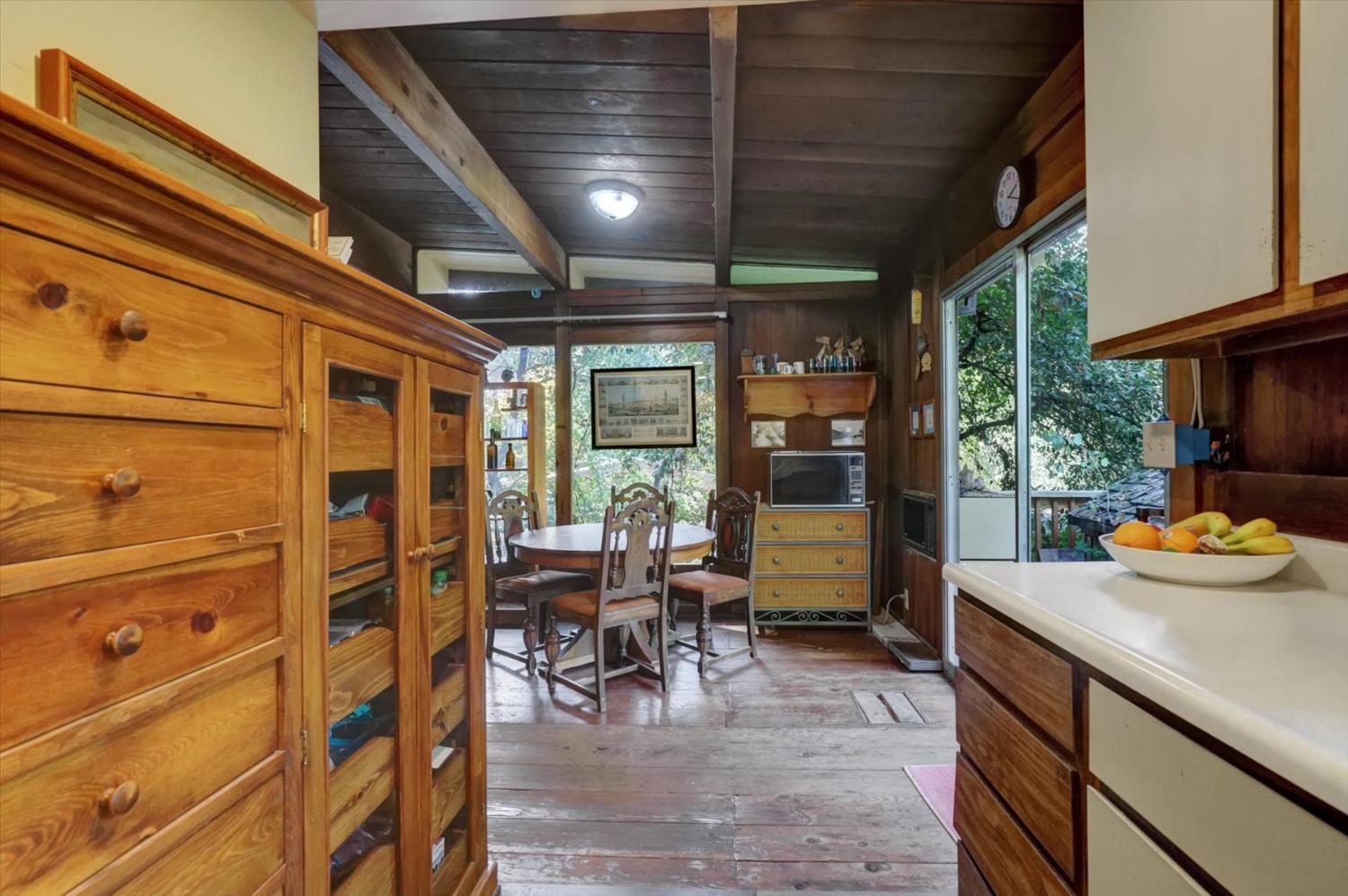 10046 Smith Road Grass Valley, CA 95949 - Photo 18 of 52 a view of a dining room with furniture window and outside view