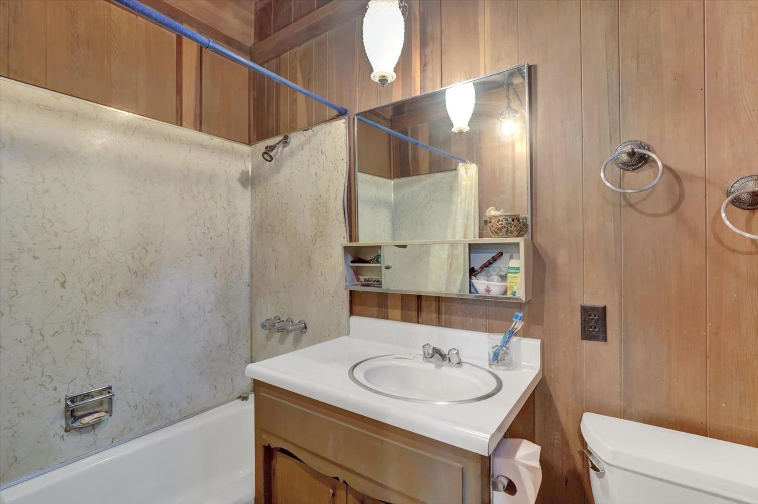 10046 Smith Road Grass Valley, CA 95949 - Photo 31 of 52 a bathroom with a sink and a mirror