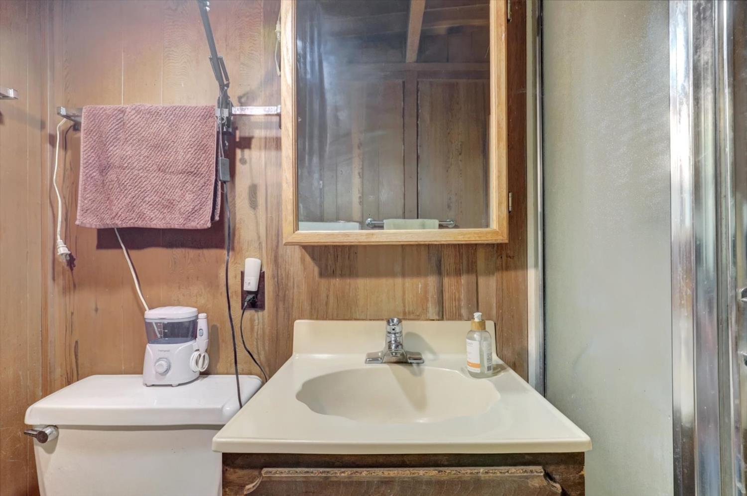 10046 Smith Road Grass Valley, CA 95949 - Photo 35 of 52 a bathroom with a sink and a toilet