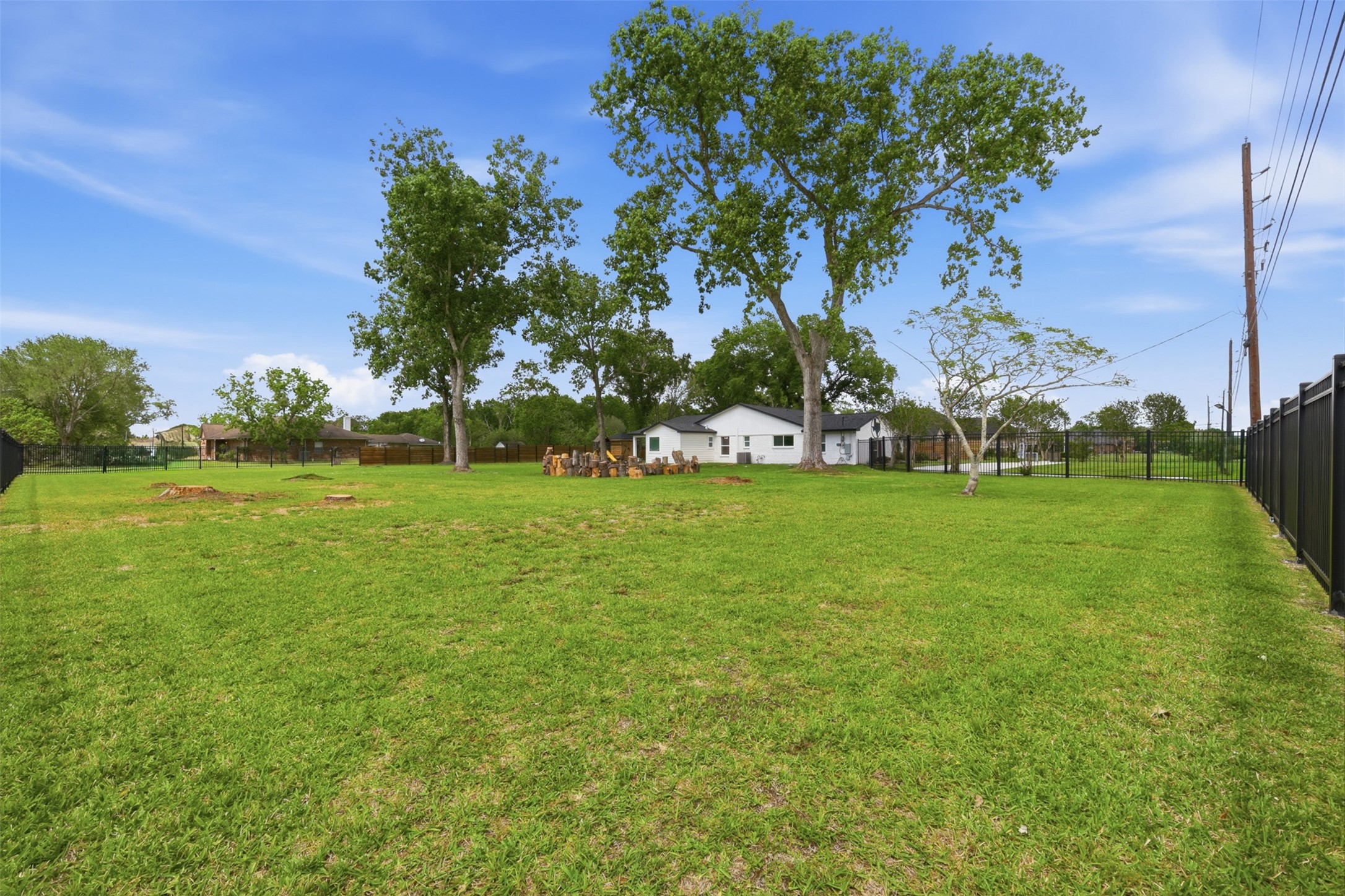 5111 Brookside Road Pearland, TX 77581 - Photo 34 of 42 Stunning backyard with plenty of space for outdoor activities and relaxation.