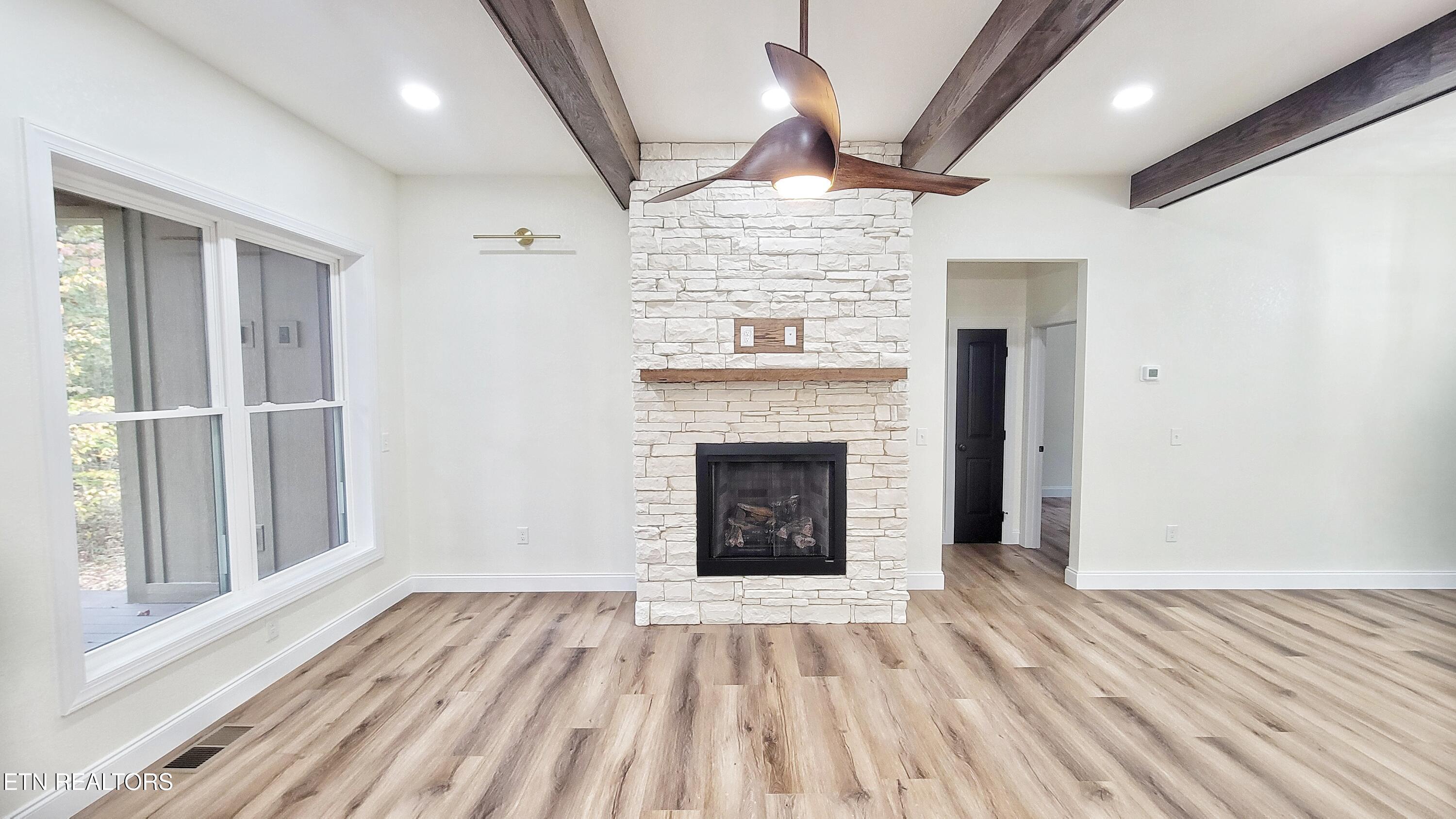 236 Meadowood Road Newport, TN 37821 - Photo 19 of 42 CUSTOM STONE GAS FIREPLACE