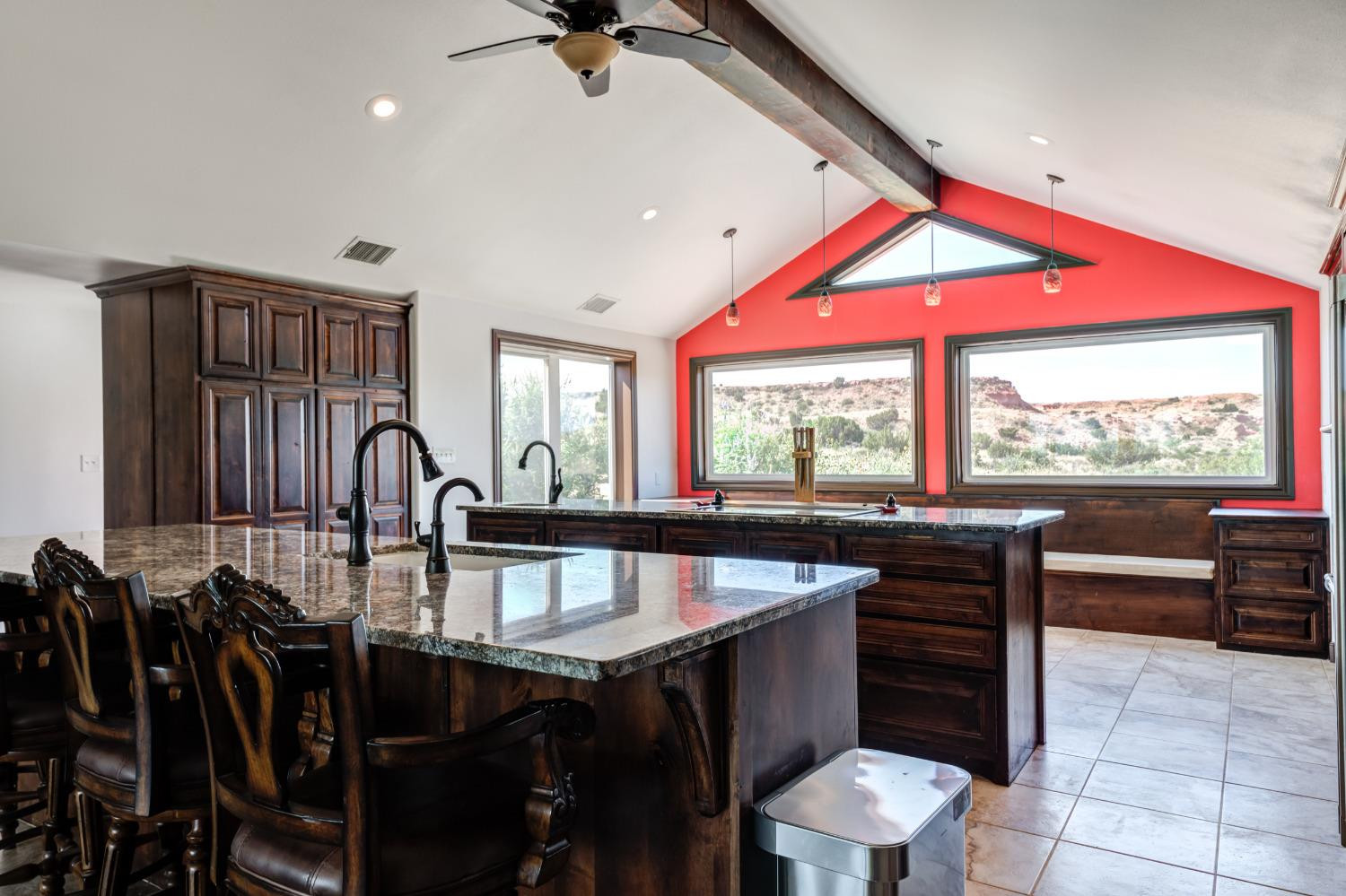 396 County Road 130 Slaton, TX 79364 - Photo 16 of 50 an open kitchen with dining table and chairs