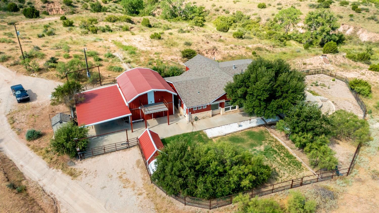 396 County Road 130 Slaton, TX 79364 - Photo 2 of 50 a view of backyard with outdoor seating and plants