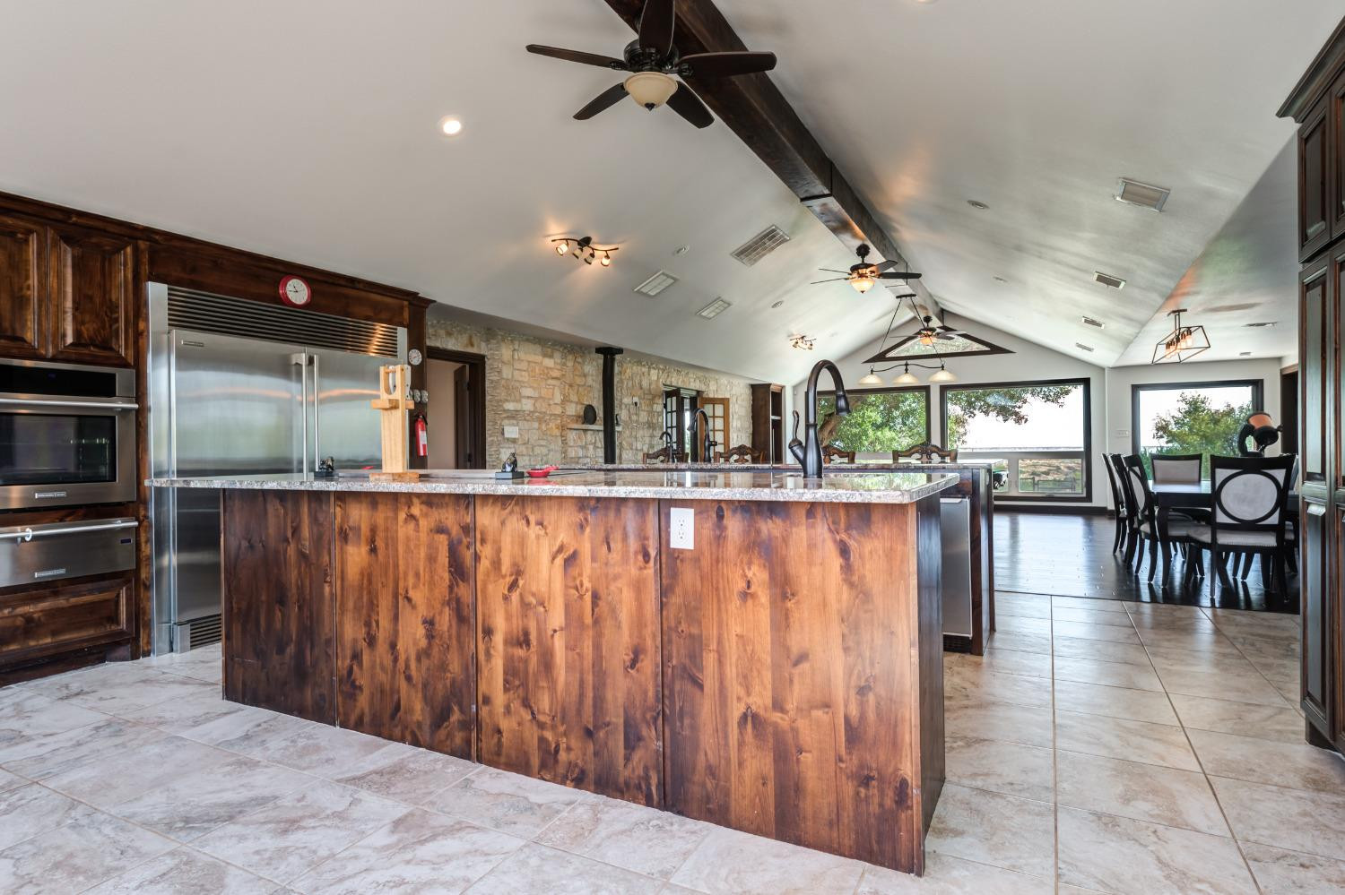 396 County Road 130 Slaton, TX 79364 - Photo 21 of 50 a view of a living room and a kitchen