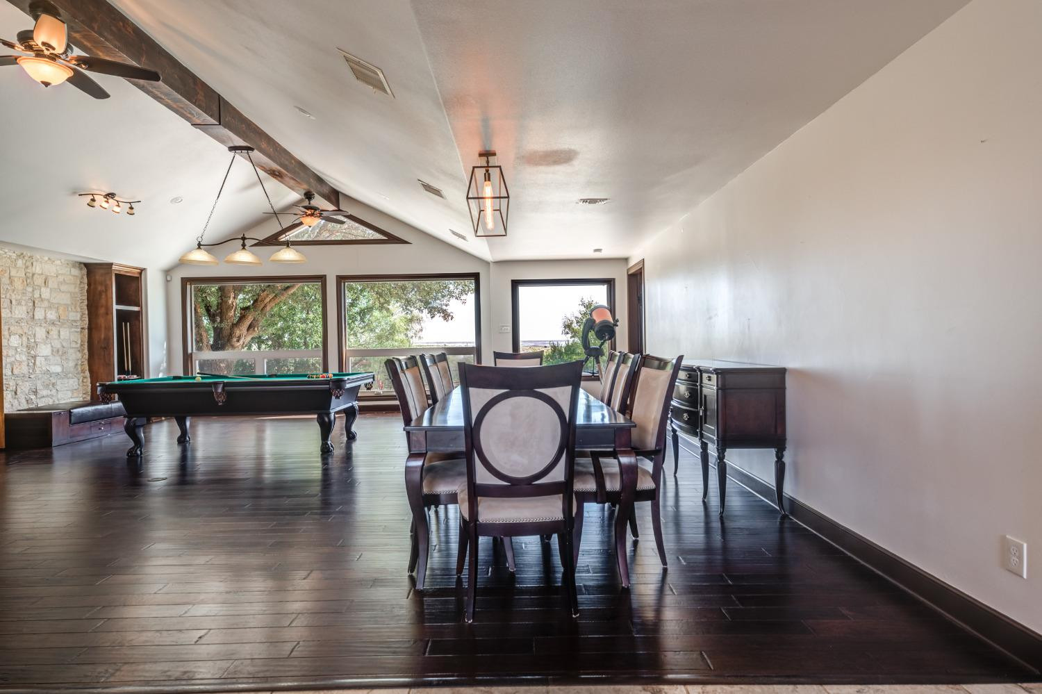 396 County Road 130 Slaton, TX 79364 - Photo 22 of 50 a view of a dining room with furniture window and wooden floor