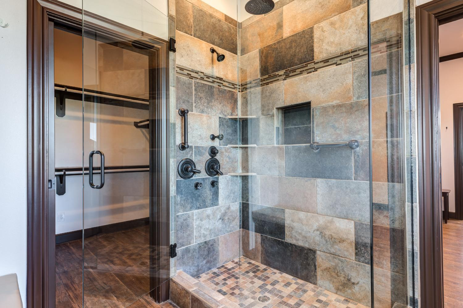 396 County Road 130 Slaton, TX 79364 - Photo 33 of 50 a bathroom with a glass shower door