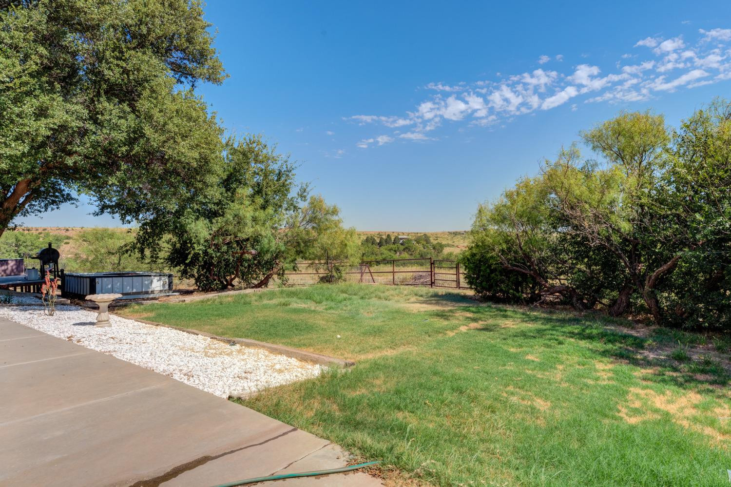 396 County Road 130 Slaton, TX 79364 - Photo 43 of 50 a view of a golf course with a house