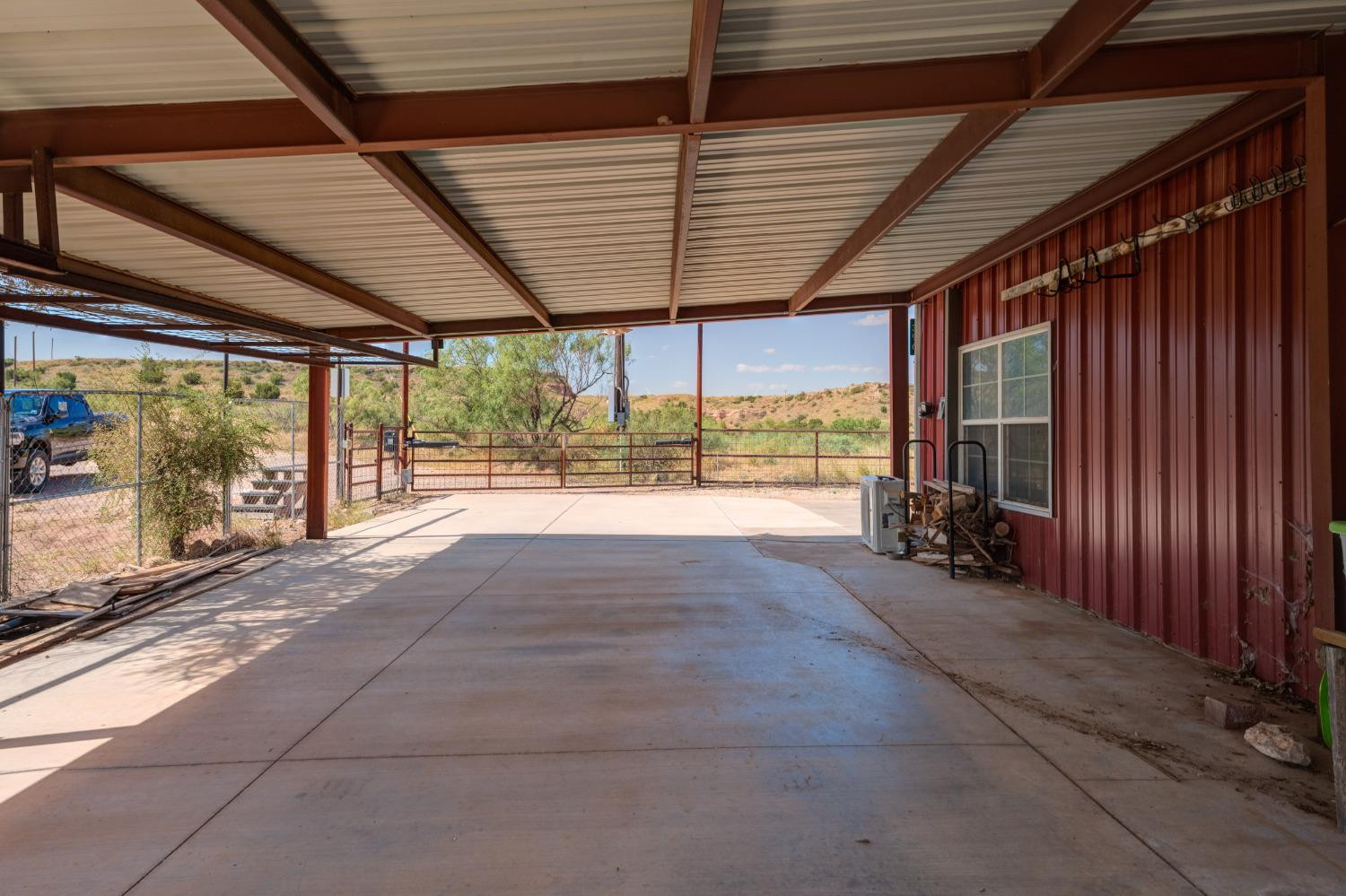 396 County Road 130 Slaton, TX 79364 - Photo 47 of 50 a view of a room with wooden walls