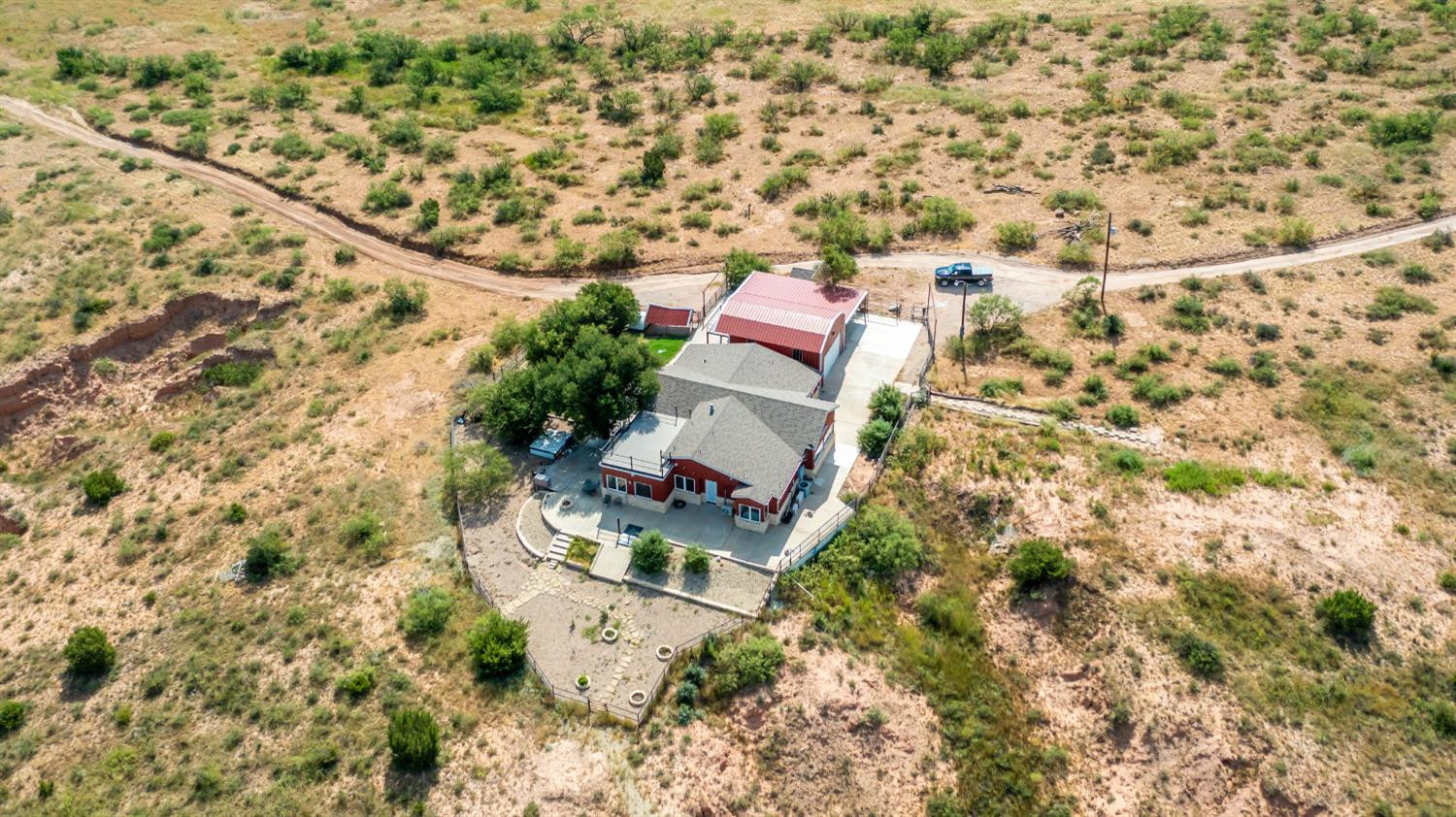 396 County Road 130 Slaton, TX 79364 - Photo 6 of 50 an aerial view of house with yard