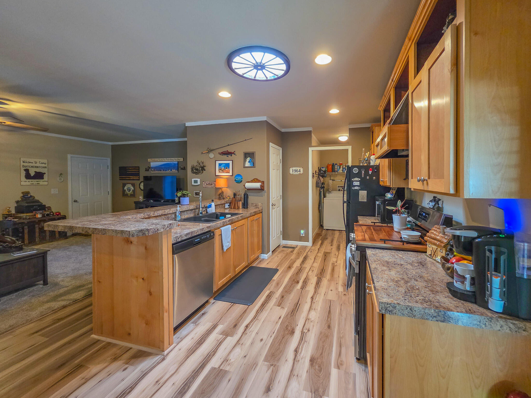 537 Thompson Creek Road, Unit 16 Jacksonville, OR 97530 - Photo 15 of 30 a large kitchen with lots of counter space and stainless steel appliances