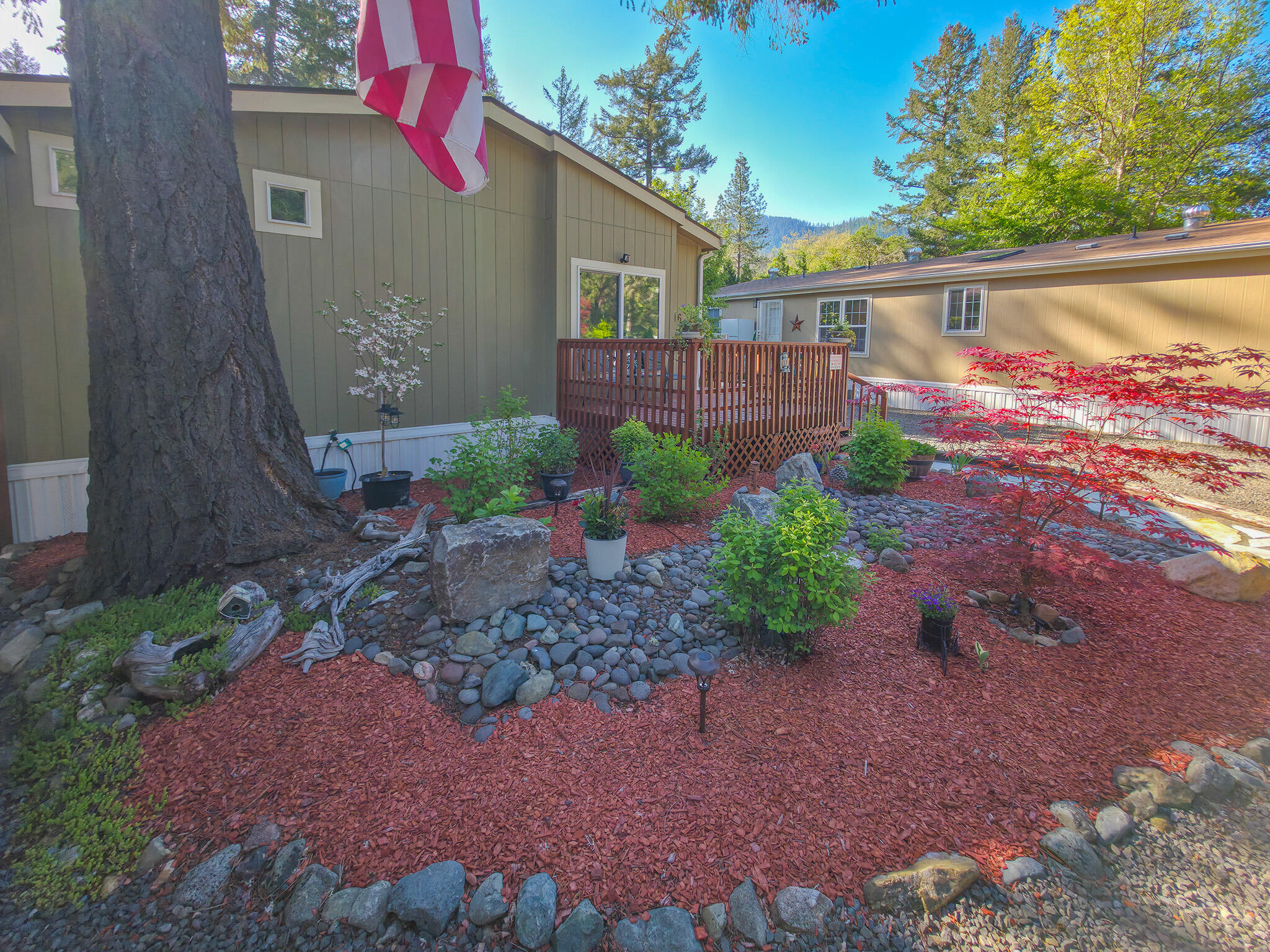 537 Thompson Creek Road, Unit 16 Jacksonville, OR 97530 - Photo 2 of 30 a view of a backyard