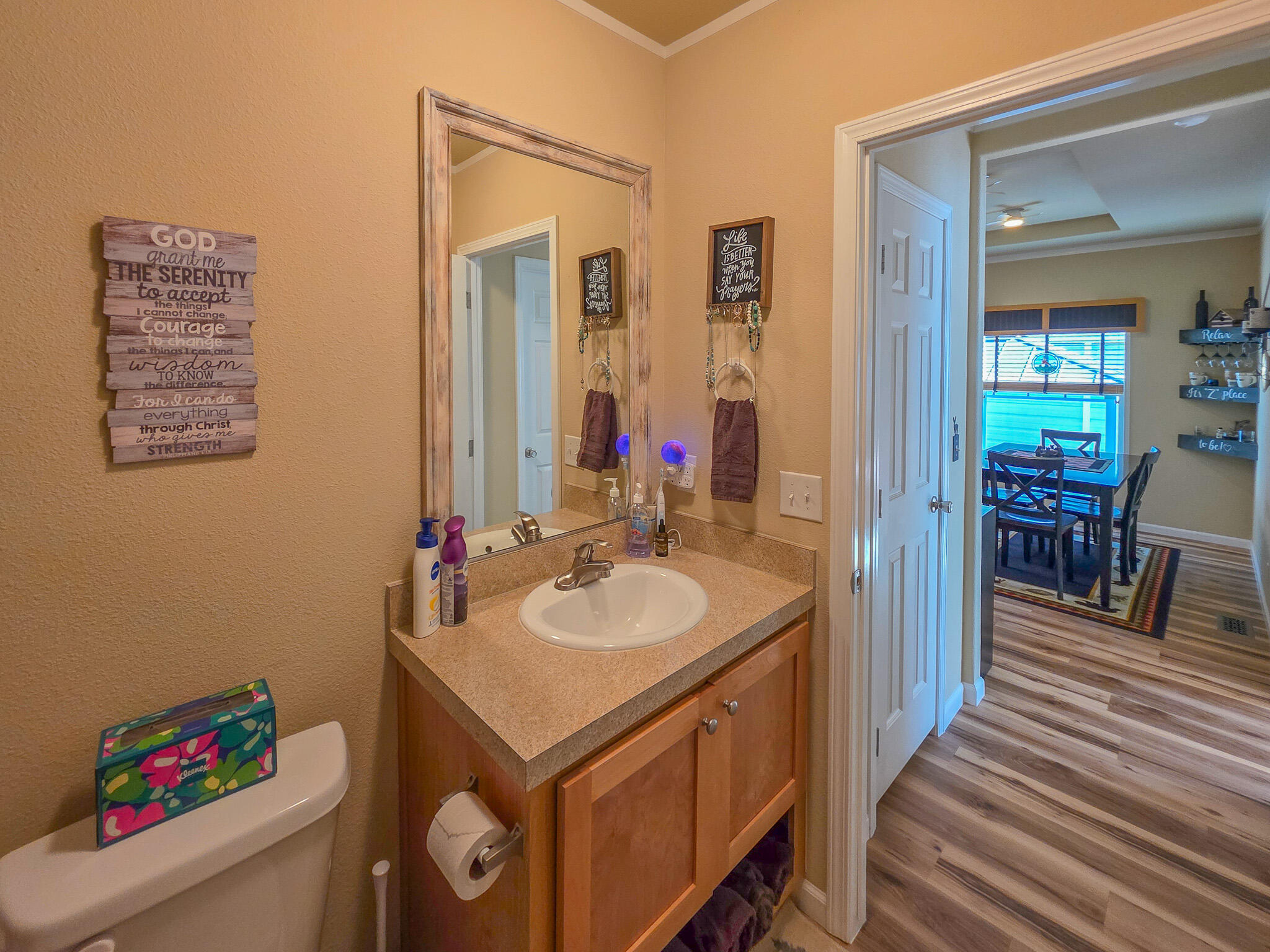 537 Thompson Creek Road, Unit 16 Jacksonville, OR 97530 - Photo 23 of 30 a bathroom with a sink a vanity and a mirror